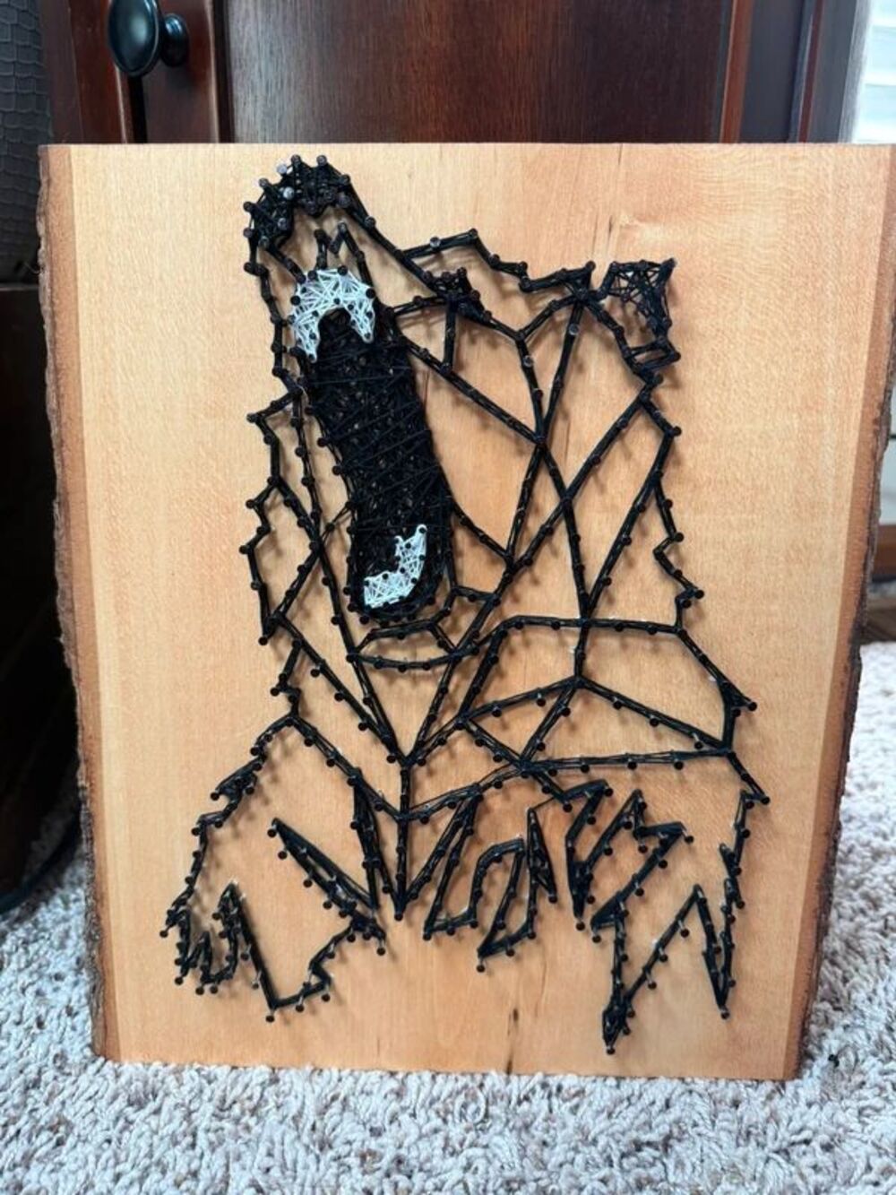 Man cave decor- geometric bear on a log slice
